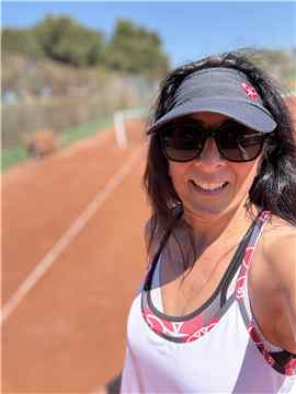 Adeline Arjad at tennis court — Love Love Tennis founder enjoying the sport she loves